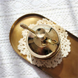 spray de latón dorado