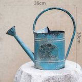 regadera vintage con mango grande