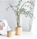 jarrón con base de madera