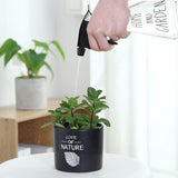 spray ajustable para plantas de interior