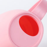 regadera en plastique rose