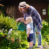 regadera de plástico verde 