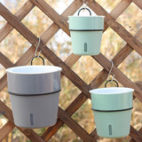 maceta de pared de riego