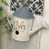 déco jardín regadera