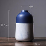 florero azul y blanco