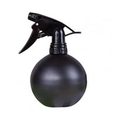 pequeña botella de spray negra